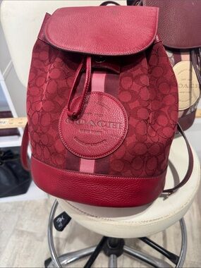 COACH Red Signature Canvas Drawstring Backpack with Stripe Detail